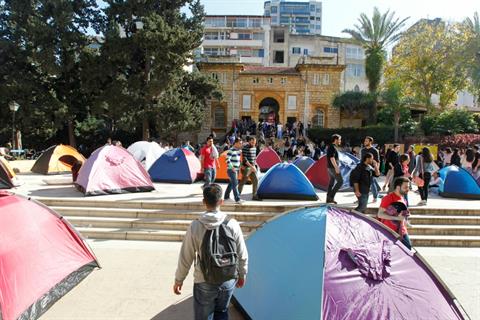 AUB students erect tents on campus in protest of proposed tuition hike on Wednesday, April 2, 2014. (The Daily Star/Mohammad Azakir)