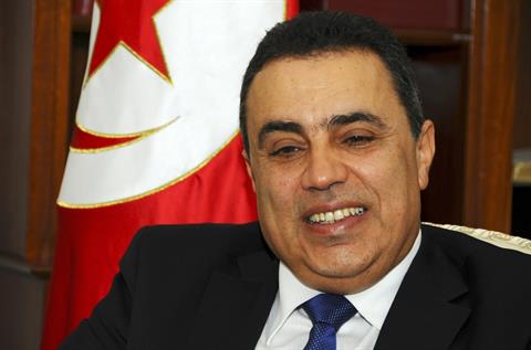 File - Tunisian Prime Minister Mehdi Jomaa talks to The Associated Press in Tunis. Ahead of his meeting with President Barack Obama on Friday April 4, 2014, (AP Photo/Hassene Dridi)