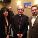 Elie and Marlene Tohme pose with Bishop A. Elias Zaidan.