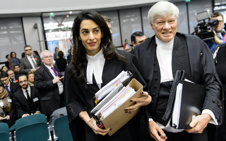Amal Alamuddin Clooney, left, and Geoffrey Robertson arrive for the hearing in the case Perincek vs Switzerland. Photo: EPA