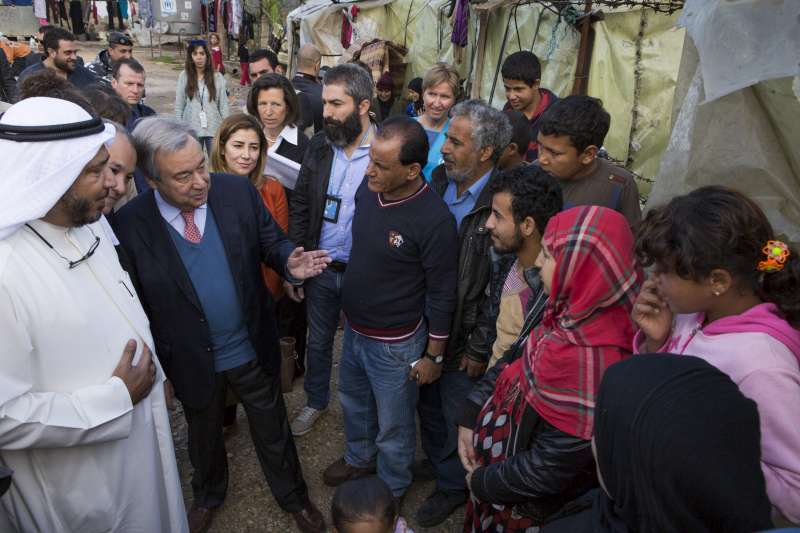 High Commissioner for Refugees António Guterres and Humanitarian Envoy for Kuwait Abdullah Al-Matouq (left) visit an Informal Settlement for Syrian refugees near Ghaziye, southern Lebanon. UNHCR/I. Prickett