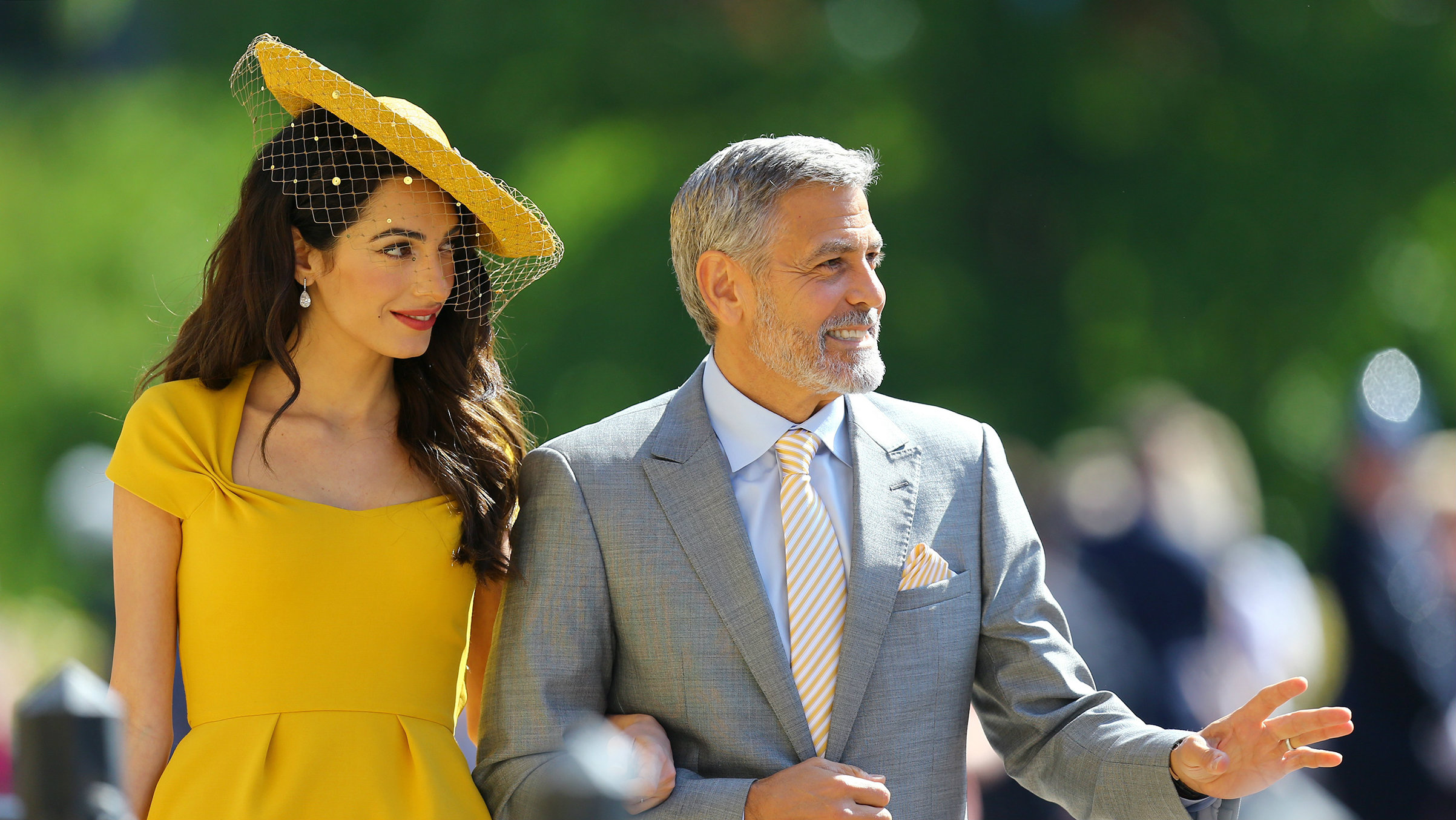 Amal Clooney Shines In Canary yellow Dress At Royal Wedding