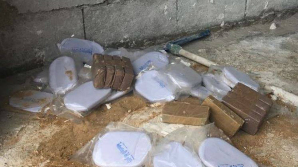Photos show the marijuana blocks recovered from a warehouse in Ouzai. (Photo provided/Internal Security Forces)