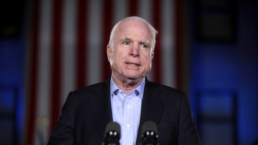 Sen. John McCain defended then-candidate Barack Obama when a voter began mentioning a racist conspiracy theory. (File photo)